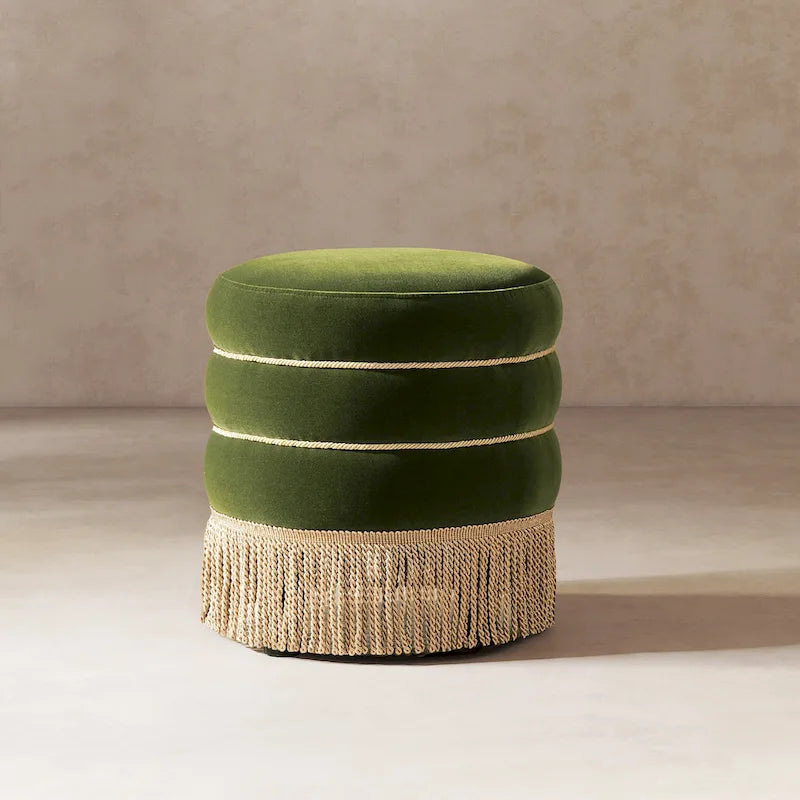Repose-pieds rond et rembourré, orné de pompons en fil d'or
