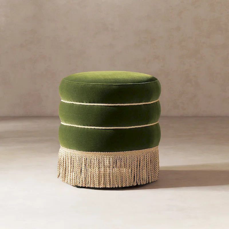 Repose-pieds rond et rembourré, orné de pompons en fil d'or