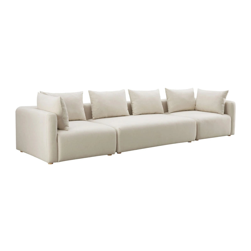 Très long canapé capitonné couleur crème (368 cm)