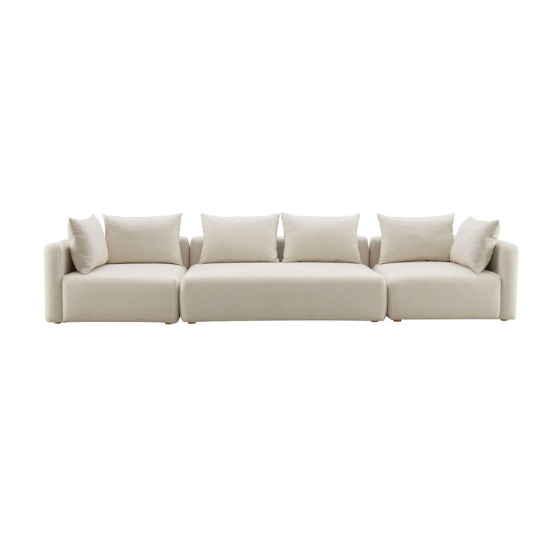 Très long canapé capitonné couleur crème (368 cm)