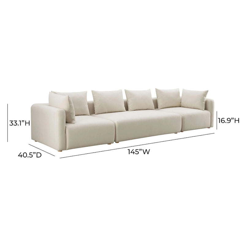 Très long canapé capitonné couleur crème (368 cm)