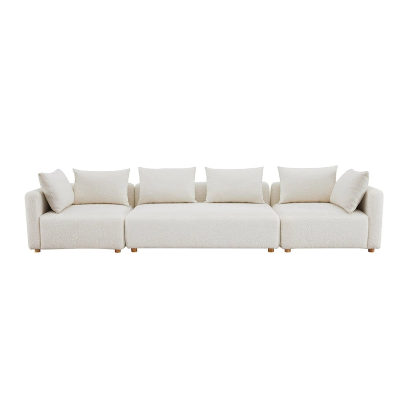 Très long canapé capitonné couleur crème (368 cm)