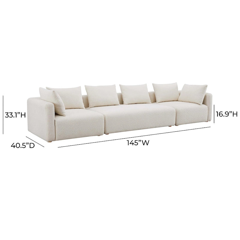 Très long canapé capitonné couleur crème (368 cm)