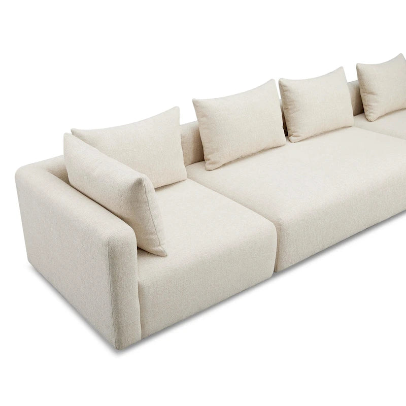 Très long canapé capitonné couleur crème (368 cm)